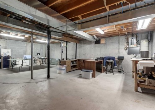 268 Pump Hill Gardens Sw, Calgary, AB - Indoor Photo Showing Basement