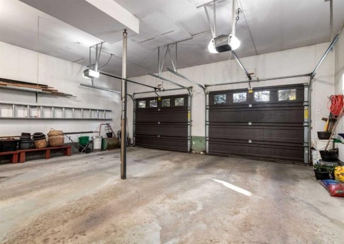 268 Pump Hill Gardens Sw, Calgary, AB - Indoor Photo Showing Garage