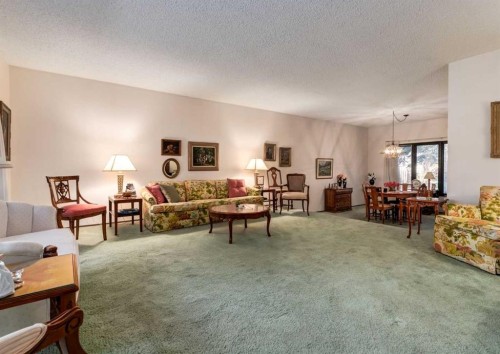 268 Pump Hill Gardens Sw, Calgary, AB - Indoor Photo Showing Living Room