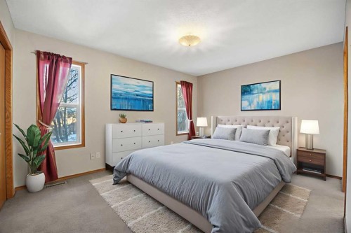 220 Sunset Place, Okotoks, AB - Indoor Photo Showing Bedroom