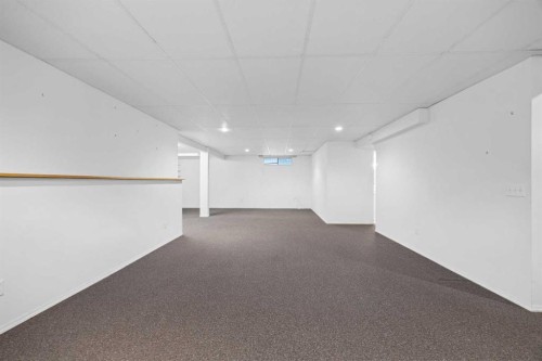 220 Sunset Place, Okotoks, AB - Indoor Photo Showing Other Room