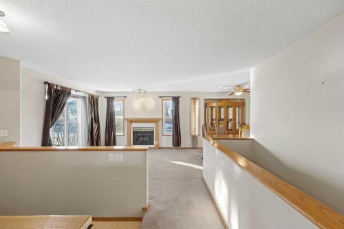 220 Sunset Place, Okotoks, AB - Indoor Photo Showing Other Room