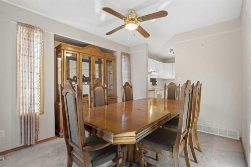 220 Sunset Place, Okotoks, AB - Indoor Photo Showing Dining Room