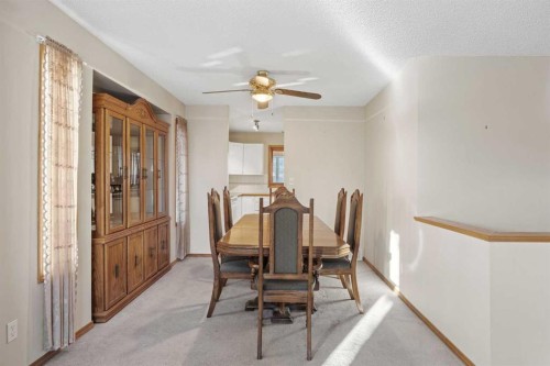 220 Sunset Place, Okotoks, AB - Indoor Photo Showing Dining Room