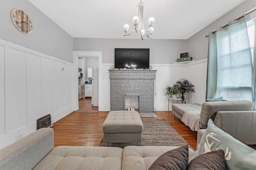 2117 17A Street Sw, Calgary, AB - Indoor Photo Showing Living Room With Fireplace