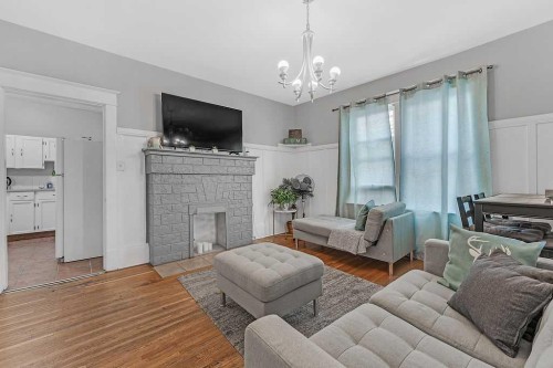 2117 17A Street Sw, Calgary, AB - Indoor Photo Showing Living Room With Fireplace