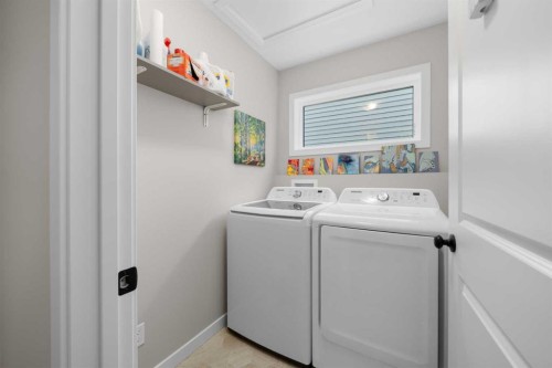 113 Amery Crescent, Crossfield, AB - Indoor Photo Showing Laundry Room