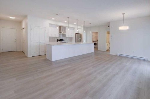 1209-550 Belmont Street Sw, Calgary, AB - Indoor Photo Showing Kitchen