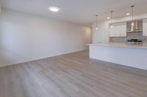 1209-550 Belmont Street Sw, Calgary, AB - Indoor Photo Showing Kitchen