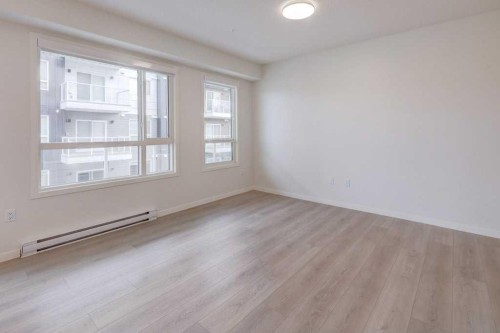 1209-550 Belmont Street Sw, Calgary, AB - Indoor Photo Showing Other Room