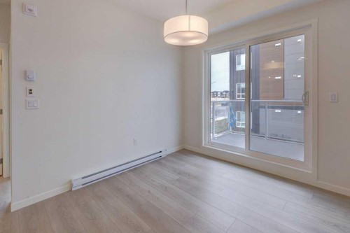 1209-550 Belmont Street Sw, Calgary, AB - Indoor Photo Showing Other Room