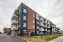 1209-550 Belmont Street Sw, Calgary, AB  - Outdoor With Facade 