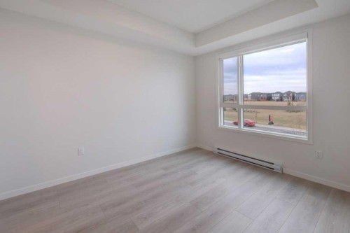 1209-550 Belmont Street Sw, Calgary, AB - Indoor Photo Showing Other Room