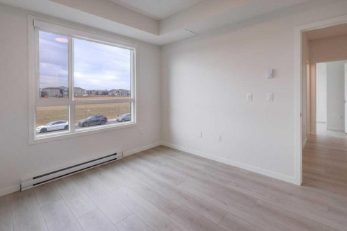 1209-550 Belmont Street Sw, Calgary, AB - Indoor Photo Showing Other Room