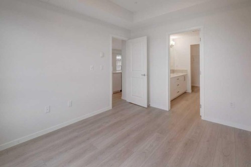 1209-550 Belmont Street Sw, Calgary, AB - Indoor Photo Showing Other Room