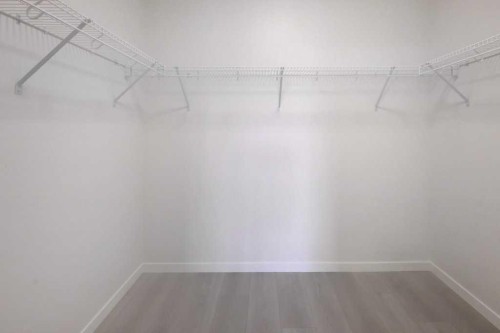 1209-550 Belmont Street Sw, Calgary, AB - Indoor With Storage