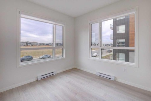 1209-550 Belmont Street Sw, Calgary, AB - Indoor Photo Showing Other Room