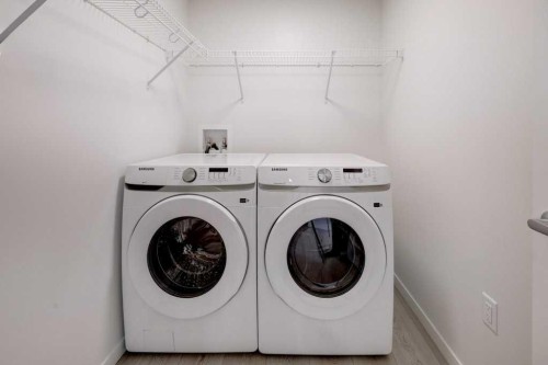 1209-550 Belmont Street Sw, Calgary, AB - Indoor Photo Showing Laundry Room