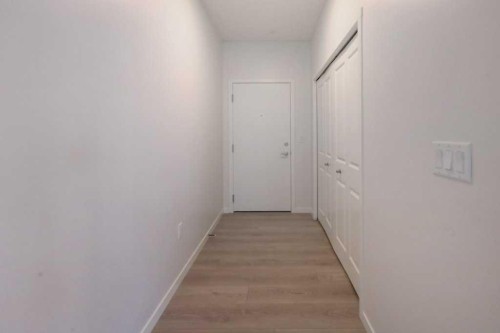 1209-550 Belmont Street Sw, Calgary, AB - Indoor Photo Showing Other Room