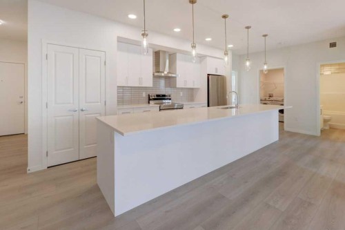 1209-550 Belmont Street Sw, Calgary, AB - Indoor Photo Showing Kitchen With Upgraded Kitchen