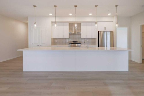 1209-550 Belmont Street Sw, Calgary, AB - Indoor Photo Showing Kitchen With Upgraded Kitchen