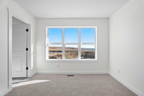 804-525 River Heights Drive, Cochrane, AB - Indoor Photo Showing Other Room