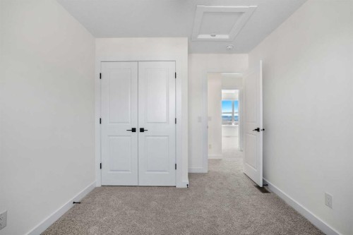 804-525 River Heights Drive, Cochrane, AB - Indoor Photo Showing Other Room