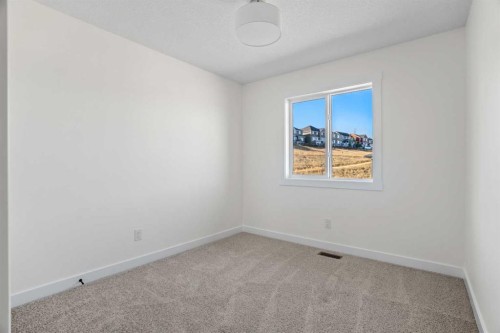 804-525 River Heights Drive, Cochrane, AB - Indoor Photo Showing Other Room