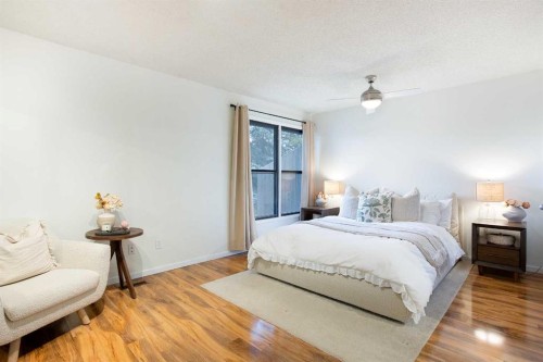 54-10030 Oakmoor Way Sw, Calgary, AB - Indoor Photo Showing Bedroom