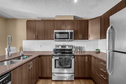 206 Cityscape Lane Ne, Calgary, AB - Indoor Photo Showing Kitchen With Stainless Steel Kitchen With Double Sink
