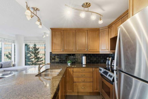 804-910 5 Avenue Sw, Calgary, AB - Indoor Photo Showing Kitchen With Stainless Steel Kitchen With Double Sink