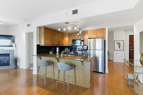 804-910 5 Avenue Sw, Calgary, AB - Indoor Photo Showing Kitchen With Stainless Steel Kitchen
