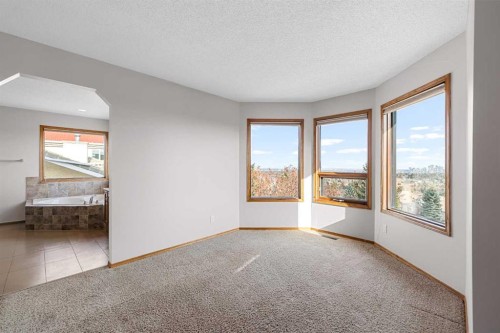 201 Signature Way Sw, Calgary, AB - Indoor Photo Showing Other Room