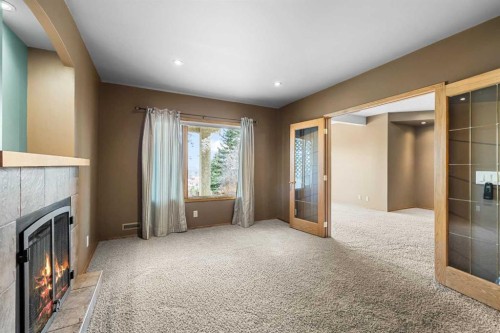 201 Signature Way Sw, Calgary, AB - Indoor With Fireplace