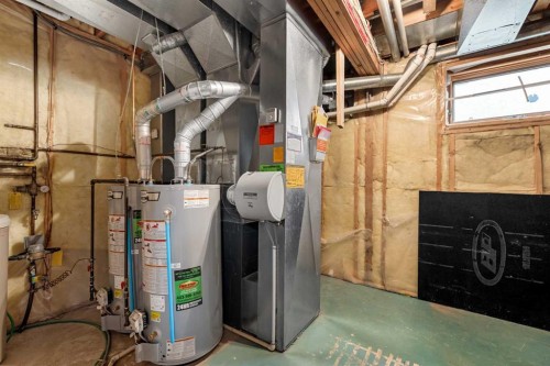 201 Signature Way Sw, Calgary, AB - Indoor Photo Showing Basement