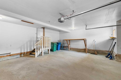 201 Signature Way Sw, Calgary, AB - Indoor Photo Showing Garage