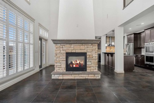 151 Mahogany Bay Se, Calgary, AB - Indoor Photo Showing Living Room With Fireplace