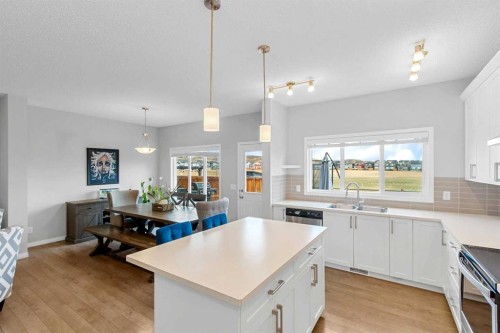 68 Morgan Street, Cochrane, AB - Indoor Photo Showing Kitchen With Upgraded Kitchen