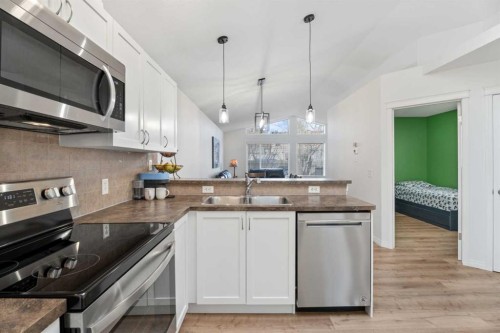 139 Auburn Bay Heights Se, Calgary, AB - Indoor Photo Showing Kitchen With Double Sink With Upgraded Kitchen