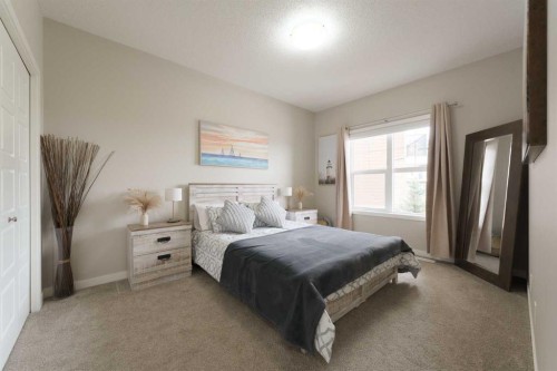 701-250 Fireside View, Cochrane, AB - Indoor Photo Showing Bedroom