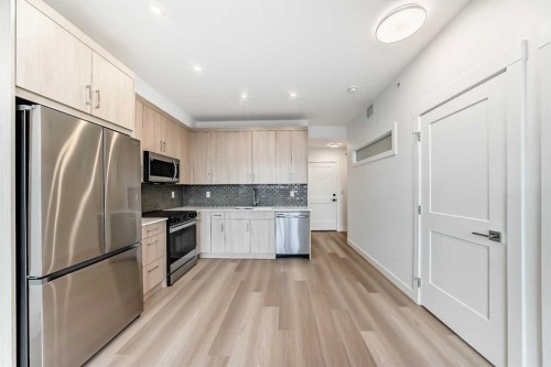 1411-430 Sage Hill Road Nw, Calgary, AB - Indoor Photo Showing Kitchen With Stainless Steel Kitchen