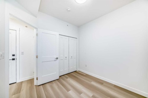 1411-430 Sage Hill Road Nw, Calgary, AB - Indoor Photo Showing Other Room