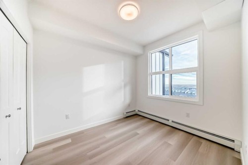 1411-430 Sage Hill Road Nw, Calgary, AB - Indoor Photo Showing Other Room