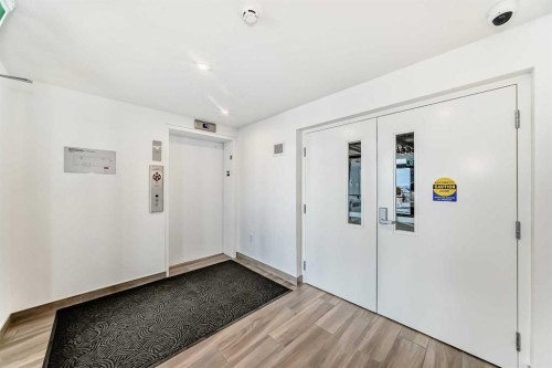 1411-430 Sage Hill Road Nw, Calgary, AB - Indoor Photo Showing Other Room