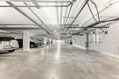 1411-430 Sage Hill Road Nw, Calgary, AB - Indoor Photo Showing Garage