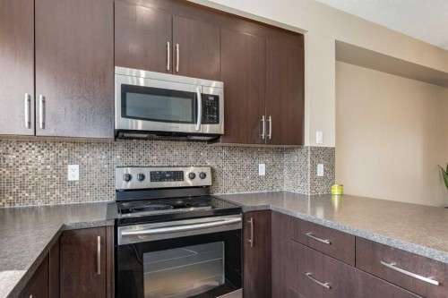 152 New Brighton Grove Se, Calgary, AB - Indoor Photo Showing Kitchen With Upgraded Kitchen