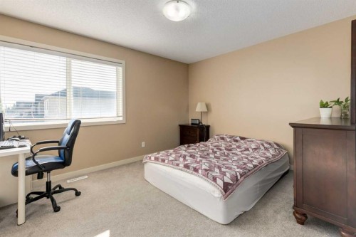 152 New Brighton Grove Se, Calgary, AB - Indoor Photo Showing Bedroom
