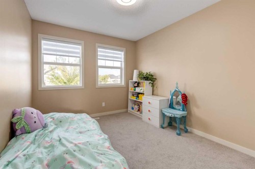 152 New Brighton Grove Se, Calgary, AB - Indoor Photo Showing Bedroom