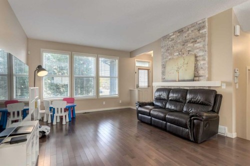 152 New Brighton Grove Se, Calgary, AB - Indoor Photo Showing Living Room
