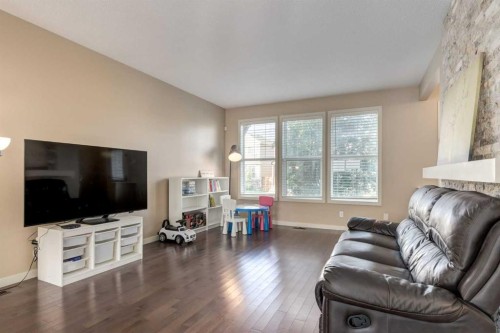 152 New Brighton Grove Se, Calgary, AB - Indoor Photo Showing Living Room